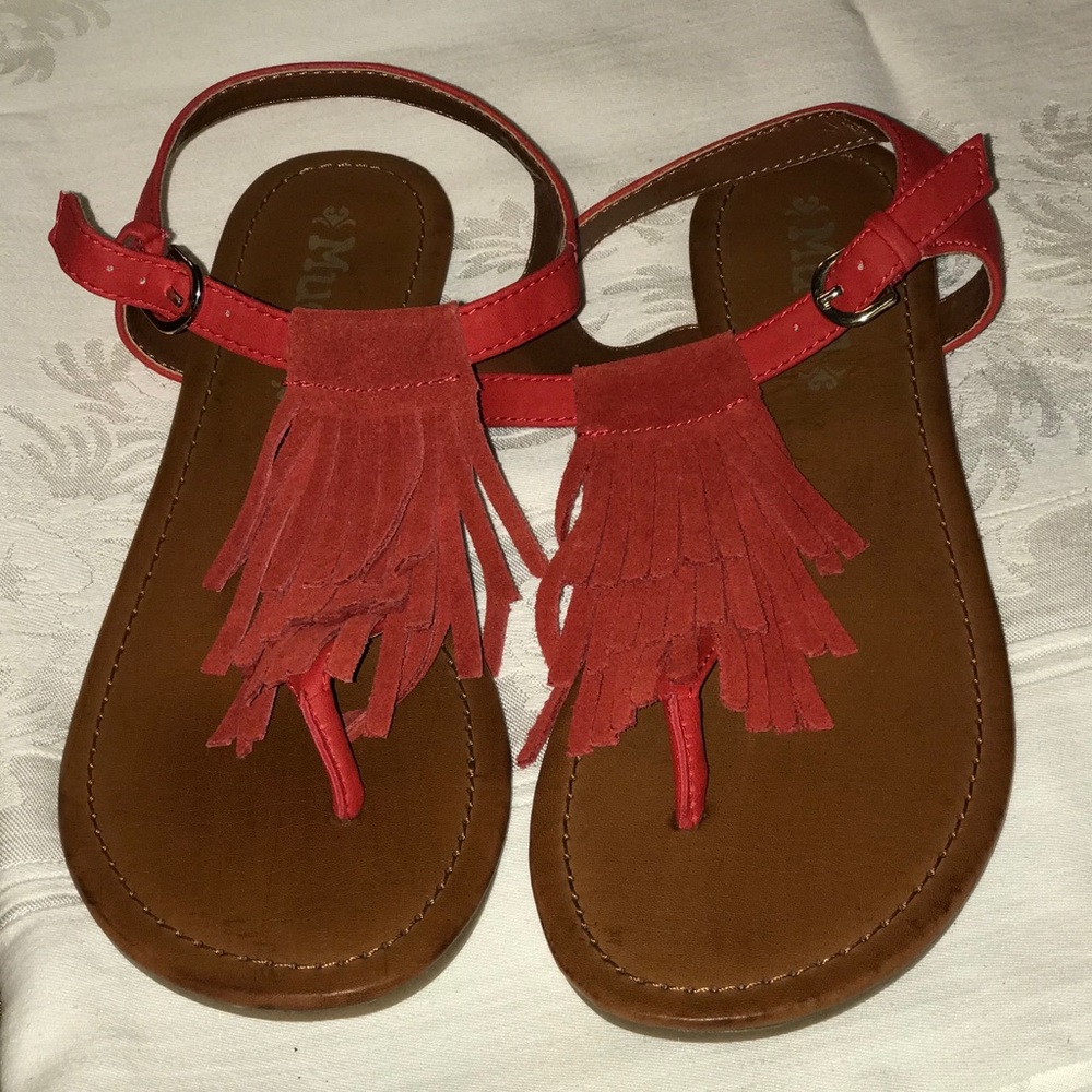 Red fringe sandals, flip flop style